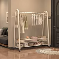 White Clothes Rack With Hanging Clothes And Storage Shelves For Baskets Boxes And Shoes