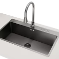 Modern Black Kitchen Sink With Undermount Design And Silver Gooseneck Faucet On Light Countertop