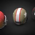 Three Different American Football Helmets with Black Red Gold Colors and Star Dot Patterns