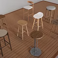 Various Style Bar Stools With Wooden Metal And Upholstered Seats On Wooden Floor
