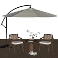 Outdoor Chairs With Small Round Table And Large Umbrella On Wooden Deck