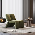 Green Velvet Single Sofa In Modern Living Room With Fireplace And Side Table