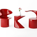 Red Modern Curved Single Chair with Unique Design and Side Table White Vase Pink Flowers