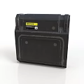 Black Industrial Equipment With Yellow Warning Label And Rugged Square Design