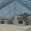 Main Glass Pyramid of Louvre with Smaller Pyramids in Open Square and Blue Sky