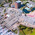 Aerial Planning of Commercial District with Buildings Parking Lots Water Pools and Green Areas