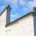Warm Yellow Decorative Lights Illuminating Traditional Building Walls With Black Tiled Roof At Night