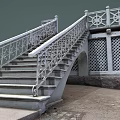 Decorative Stone Staircase With Ornate Metal Railings And Lattice Wall Design