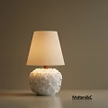 Elegant Modern Table Lamp With Textured White Base And Beige Fabric Shade