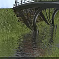 Beautiful Scenery with Arched Black Iron Bridge Over Water and Green Grass Reflections