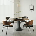 Modern Round Table And Chairs Set With Wooden Backrest Black Leather Seats And Green Plant