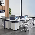 Modern Office Desk Setup With Ergonomic Chairs Laptops Storage Cabinets And Natural Light