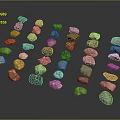 Various Colored Natural Stones With Different Shapes Arranged On Black Background