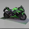Green Sport Motorcycle With Black Accents On Display Mat Gray Background