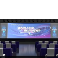 Modern Conference Venue Stage Setup With Large Screen And Blue Seats