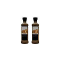 Two Brown Condiment Bottles With Pancake Images On Labels For Kitchen Use