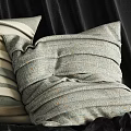 Soft Striped Decorative Pillows In Neutral Tones On Dark Fabric Surface 3d model
