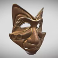 Intricately Carved Bronze Mask Featuring Detailed Facial Features And Decorative Motifs