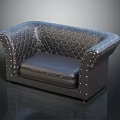 Classic Black Leather Sofa With Quilted Design And Studded Armrests
