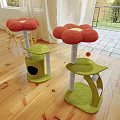 Green Cat Tree With Red Flower Shaped Top Platforms Cat Cave And Hanging Bell Toy