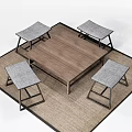 Cozy Wooden Table Set With Gray Padded Stools And Black Metal Legs On Beige Rug