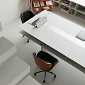 Open Public Office Space With White Structure Staircase Bookshelves Red Chair And Arched Ceiling