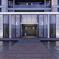 Modern Architectural Entrance Gate With Glass Doors Metal Frames And Water Reflections