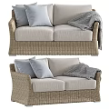 Rattan Outdoor Sofa With Beige Woven Design And Grey Cushions