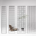 Interior White Wall with Glass Grid Partitions Brown Chair and Green Plant in Background