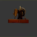 Vintage Sewing Machine With Red Wooden Base And Classic Metal Components