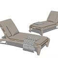 Comfortable Wooden Frame Outdoor Lounge Chairs With Light Cushions And Fringed Blankets