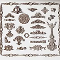 Multiple Carved Decorative Elements With Various Ornate Designs And Intricate Patterns