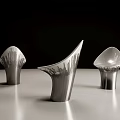 Modern Leisure Chair With Sculptural Curved Shape And Elegant Metallic Design