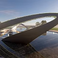 Curved Metal Landscape Sculpture with Illuminated Water Feature and Park Greenery