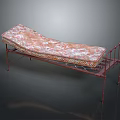 Vintage Iron Frame Bench With Floral Patterned Cushion And Decorative Metal Legs