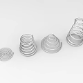 Playground Equipment With Silver Metal Spiral Structures In Various Shapes