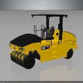 Yellow CAT Road Roller With Black Top And Heavy Duty Wheels