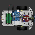 Robot Car With White Chassis Yellow Wheels Electronic Components And Colorful Wires