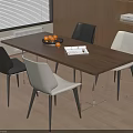 Modern Interior Wooden Dining Table Set With Black White Chairs Fruit Bowl And Open Book