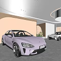 Sleek Modern Cars In Contemporary Showroom With Curved Lighting And Stylish Design