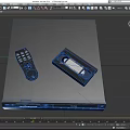 Modern Black Entertainment Media Player With Remote Control And Cassette Tape On Top