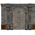Stone Wall Arched Door Design With Metal Decorations And Wall Sconces