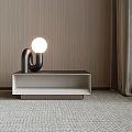 Modern Nightstand Design With Black Curved Table Lamp And Round Glowing Bulb