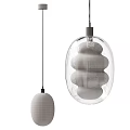 Modern Transparent Glass Pendant Lights With Blue Brown Hues And Warm Soft Lighting Design
