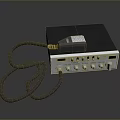 Computer Accessory With Black Top Panel Knobs Indicator Lights And Gray Cable 3d model