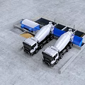 Industrial Equipment Setup For Concrete Production With Cement Mixer Trucks And Storage Bins