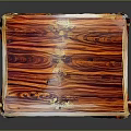 Classic Mahogany Table With Striped Wood Top And Ornate Carved Legs