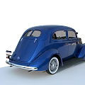 Blue Classic Vintage Car With Streamlined Design White Wheels And Retro Styling