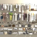 Clothes Hanging On Racks With Various Styles Colors Shoes And Bags