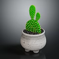 Green Cactus Plant with Yellow Dots in White Pot with Black Spots and Three Feet